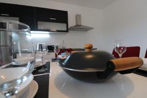 Kuchyňa alebo kuchynka v ubytovaní Apartman La maison