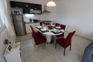 Kuchyňa alebo kuchynka v ubytovaní Apartman La maison