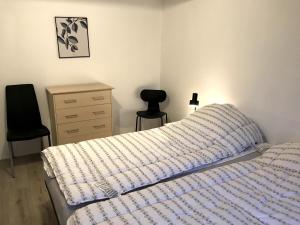 Postel nebo postele na pokoji v ubytování Genner Bygade 22 Feriehus