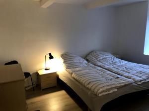Postel nebo postele na pokoji v ubytování Genner Bygade 22 Feriehus