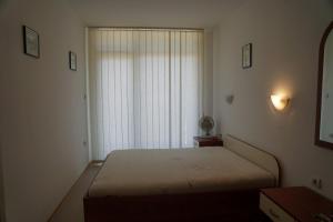 A bed or beds in a room at iBulgaria.no-Prima 1