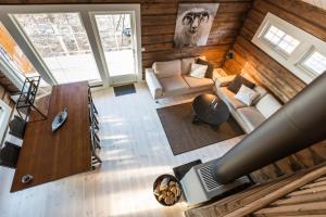 an overhead view of a living room with wood walls at Mountain View in Stranda