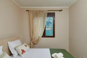 Llit o llits en una habitació de Blanka Sea View Apartments