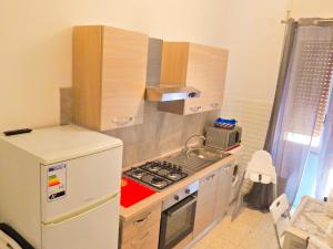 A kitchen or kitchenette at B&B RESTO AL SUD