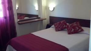 Letto o letti in una camera di Aparthotel Avenida