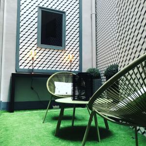 Coin salon dans l'établissement Hotel Cote Basque