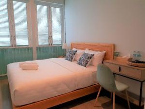 Postel nebo postele na pokoji v ubytování Latima Boutique Hostel