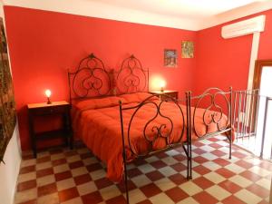 Ein Bett oder Betten in einem Zimmer der Unterkunft Antico Palazzo Affitti brevi