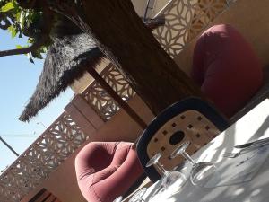 a view of a table with a sink in front of a bridge at Hôtel de la Mer - Barcarès, à 100 m de la plage in Le Barcarès