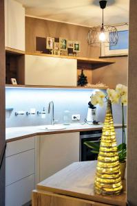 a kitchen with a christmas tree on a table at 33 Paveestraße in Eupen