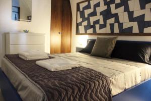 A bed or beds in a room at Amalfi Sea view First floor “Casa Mia “
