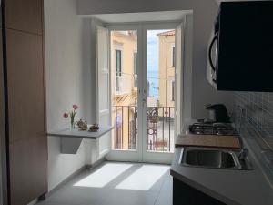 A kitchen or kitchenette at Amalfi Sea view First floor “Casa Mia “