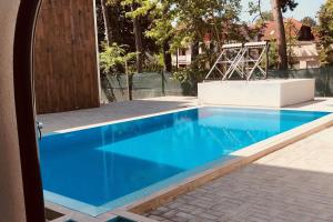 The swimming pool at or close to PR1MO Apartmanok