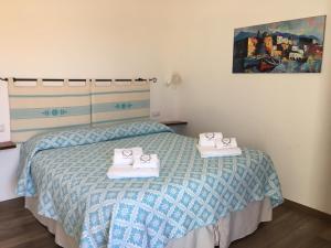 Voodi või voodid majutusasutuse Su Corittu Guesthouse toas