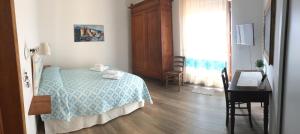 Voodi või voodid majutusasutuse Su Corittu Guesthouse toas