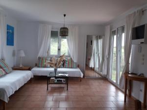 Postel nebo postele na pokoji v ubytování Villa Kos