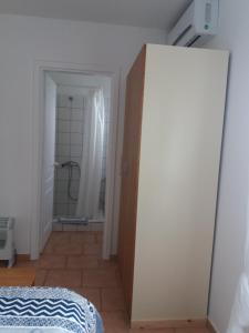 Postel nebo postele na pokoji v ubytování Villa Kos