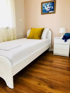 Postel nebo postele na pokoji v ubytování Joy Hotel