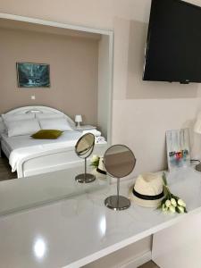 Postel nebo postele na pokoji v ubytování Joy Hotel