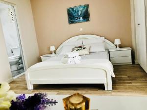 Postel nebo postele na pokoji v ubytování Joy Hotel
