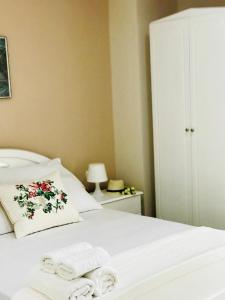 Postel nebo postele na pokoji v ubytování Joy Hotel