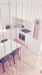 Virtuvė arba virtuvėlė apgyvendinimo įstaigoje Évora Art&Accommodation