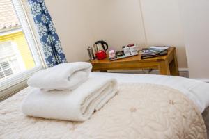 Cama ou camas em um quarto em The Red Lion Hotel