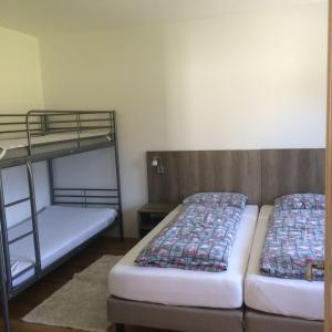 Postel nebo postele na pokoji v ubytování Apartmány Nová Pec