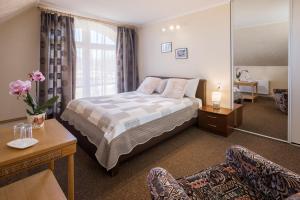 Postel nebo postele na pokoji v ubytování Karle Hotel + 37 fotografií