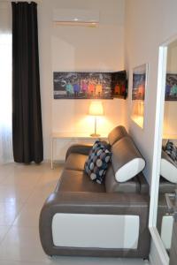 Posezení v ubytování Il profumo dei Sassi Holiday Home