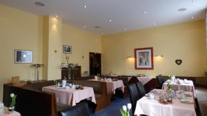 TV a/nebo společenská místnost v ubytování Central Hotel
