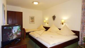 Postel nebo postele na pokoji v ubytování Central Hotel