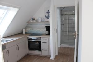 Kuchyň nebo kuchyňský kout v ubytování Ferienwohnung Dons