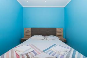 Posteľ alebo postele v izbe v ubytovaní apartman Marin