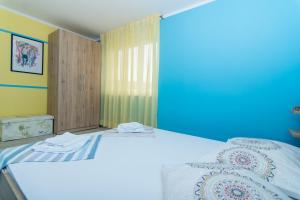 Posteľ alebo postele v izbe v ubytovaní apartman Marin