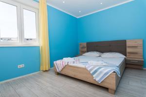 Posteľ alebo postele v izbe v ubytovaní apartman Marin