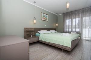 Posteľ alebo postele v izbe v ubytovaní apartman Marin