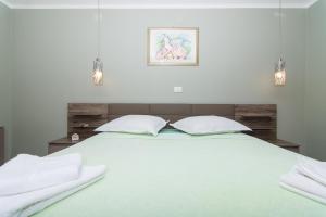 Posteľ alebo postele v izbe v ubytovaní apartman Marin