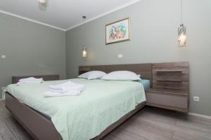 Posteľ alebo postele v izbe v ubytovaní apartman Marin