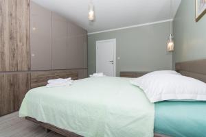 Posteľ alebo postele v izbe v ubytovaní apartman Marin