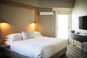 Postel nebo postele na pokoji v ubytování Mill Street Inn + 18 fotografií