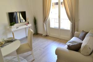 A television and/or entertainment centre at Modarno Exclusive Apartments