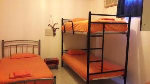 Postel nebo postele na pokoji v ubytování Villa de María