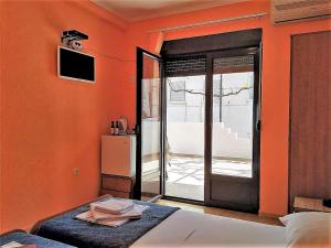 Postel nebo postele na pokoji v ubytování Villa Budvanka Guesthouse