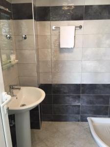 Koupelna v ubytování Valentina Rooms