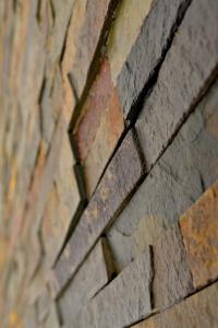 um close-up de uma parede de tijolos em Modarno Exclusive Apartments em Florença