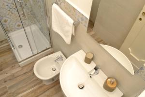 A bathroom at Modarno Exclusive Apartments
