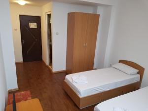 Postel nebo postele na pokoji v ubytování Casa CIC
