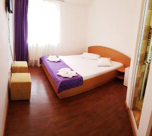 Postel nebo postele na pokoji v ubytování Casa CIC