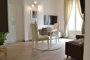 A television and/or entertainment centre at Modarno Exclusive Apartments